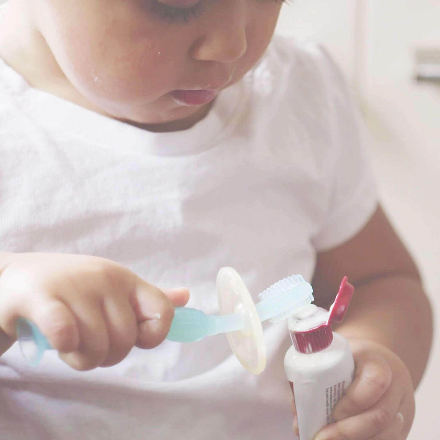 Toddler Using 360 Silicone Toothbrush